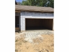 Attached, rear entry two car garage